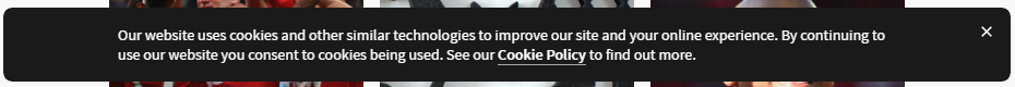 A non-compliant cookie consent informing about the use of cookies and assuming consent, while the website pre-loads optional tracking cookies right away.