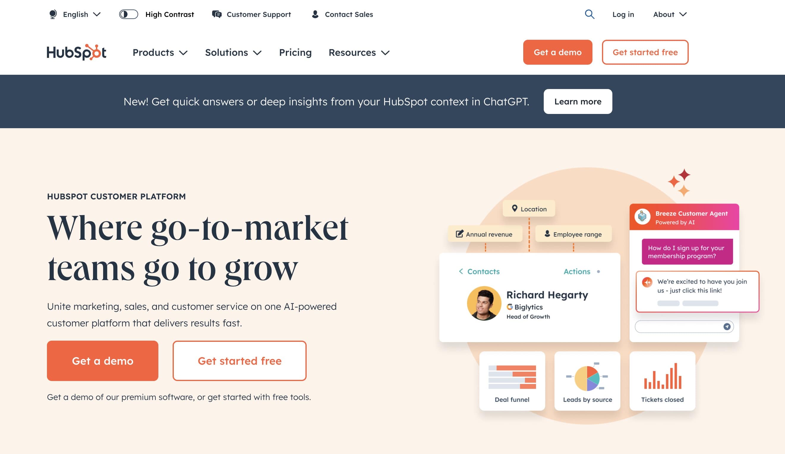 The screenshot is showing the top of the HubSpot website, where there are two large buttons. A primary orange button has a label saying "Get a demo", and right next to it a secondary, white button wiht a subtle orange border says "Get started free".